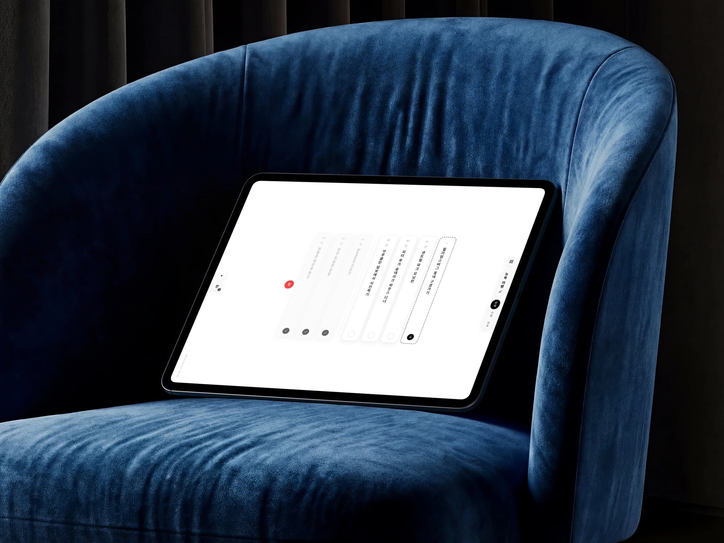 Vertically To-do on a tablet propped in a velvet armchair · tasks standing as vertical columns